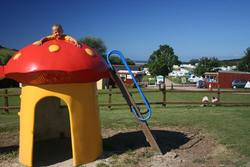 Image: The play area at Bagwell Farm Touring Park, Weymouth, Dorset